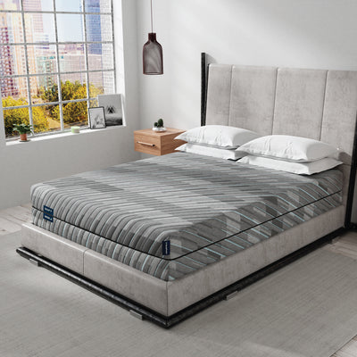 Hyphen sleep lifestyle image. Modern grey cover, double sided copper memory foam mattress.